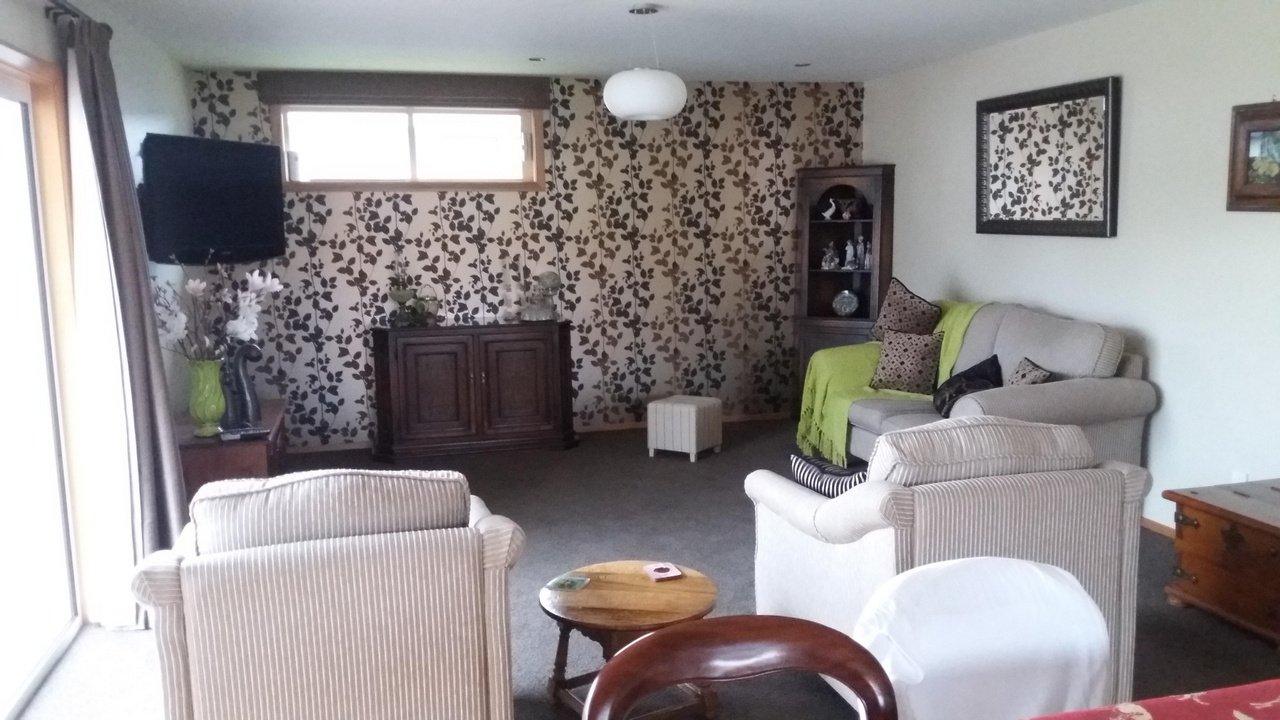 Lounge and dining area created during a Mallon Building whole-house alteration